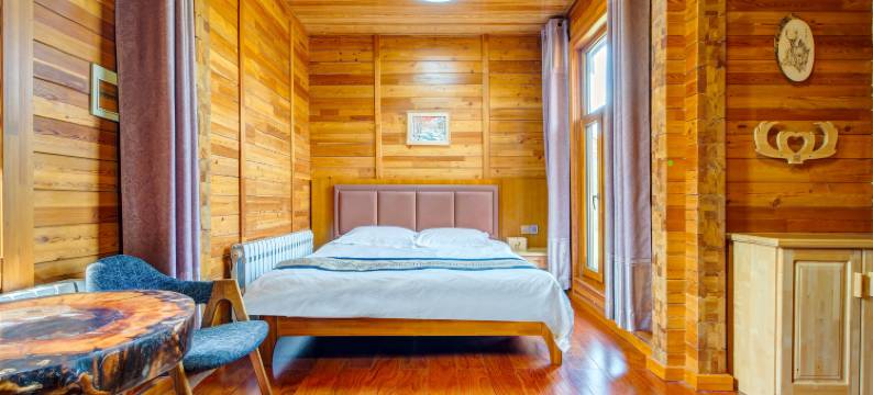 呼伦贝尔根河根林木屋宾馆图片