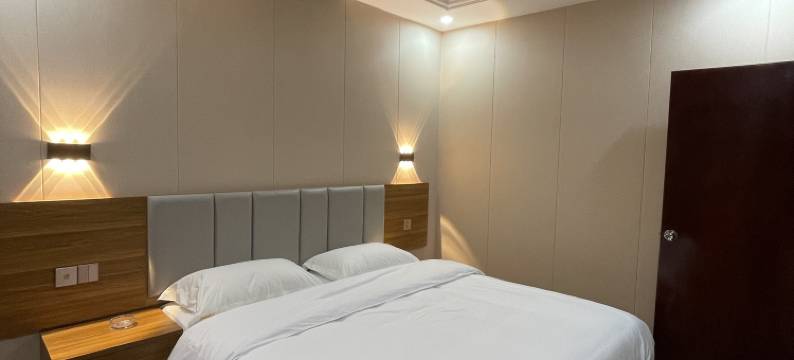 东兴海城商务酒店图片