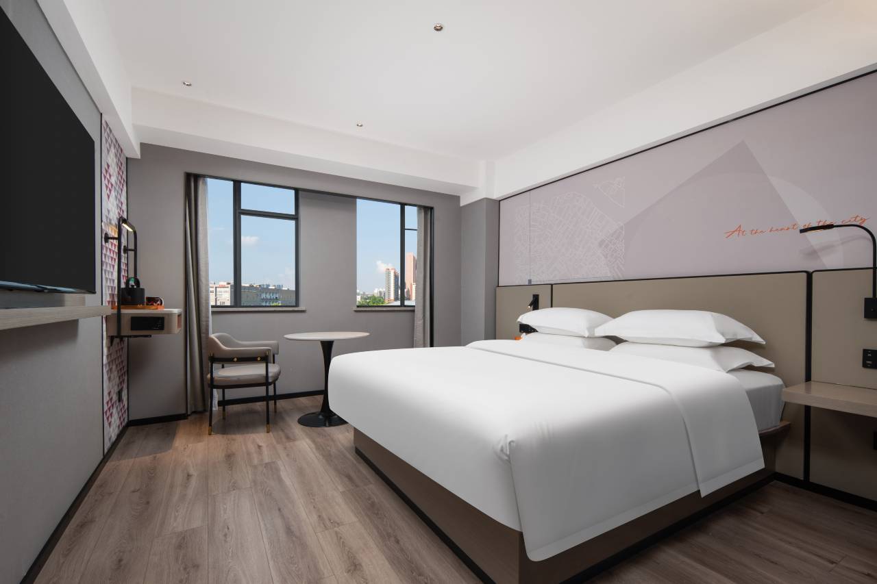 柏曼酒店(武汉永旺梦乐城江夏客厅地铁站店)图片