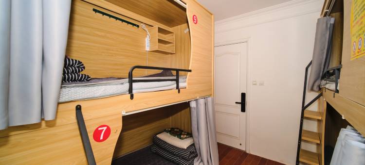 背个小包太空舱青年旅社(万象城店)图片