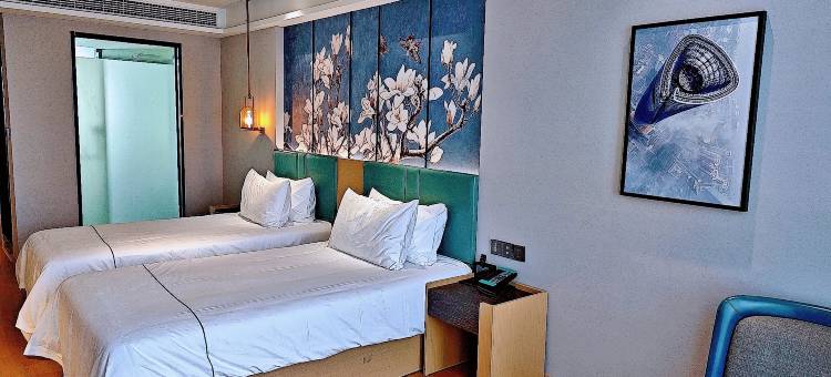 白玉兰商务酒店(黄冈浠水闻一多大道店)图片