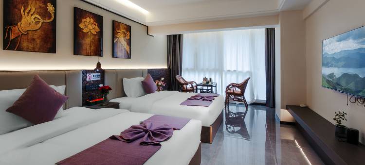 岩佤茶空间智能酒店(勐巴拉国际度假区沙河小镇店)图片