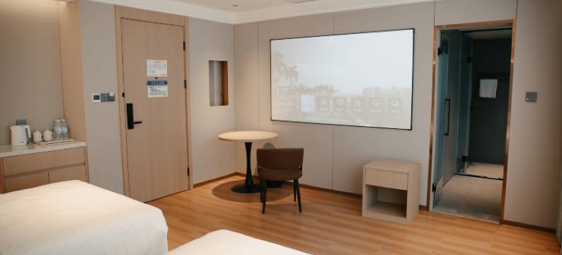 花漾舒适酒店(九曲湾温泉首创奥特莱斯店)图片