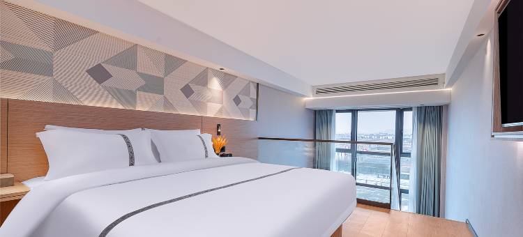 泉商酒店(柳州白莲机场毅德城店)图片