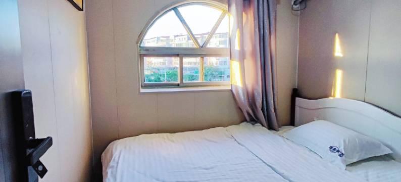 威海阳光旅馆(哈尔滨工业大学火炬八街店)图片