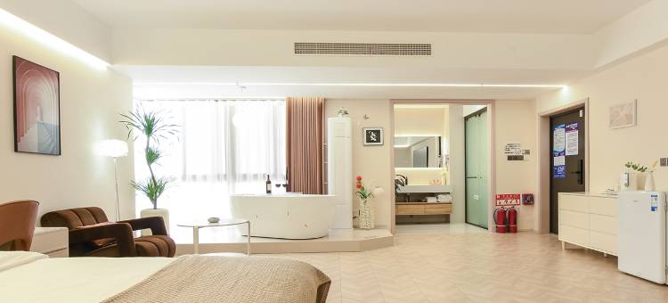 七里拾光·设计师私汤民宿(市中心苏宁广场店)图片