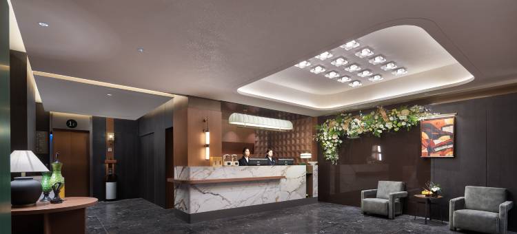 橙子酒店(阜阳颍州里二里井夜市第二中学店)图片