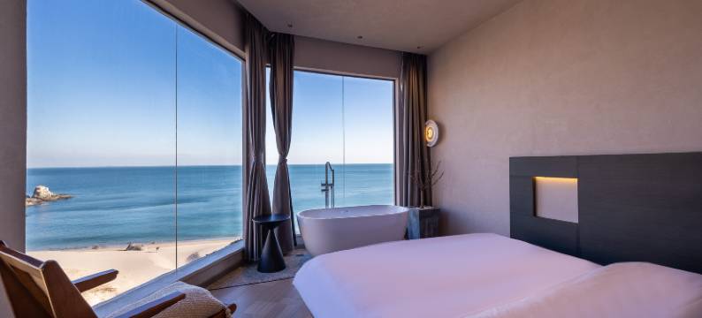 青岛印澜一宿·悬崖海景民宿(崂山风景区泉心河沙滩店)图片