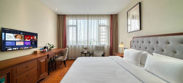 驻工坊创意酒店(温州双屿客运中心店)图片