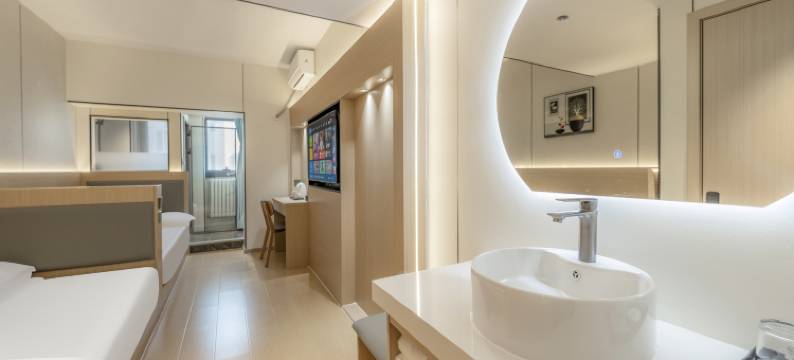 逗号酒店(经开万达广场高铁站店)图片