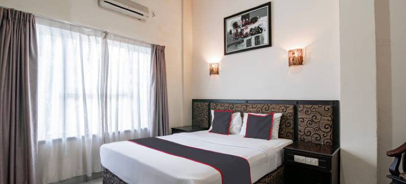 O系列德镇酒店-靠近安努尔大清真寺(Collection O Senapelan Near Rsud Petala Bumi Formerly de Town Hotel)图片