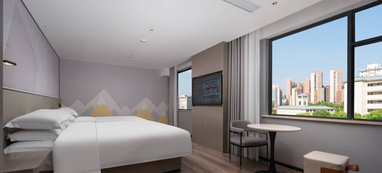 柏曼酒店(武汉永旺梦乐城江夏客厅地铁站店)图片