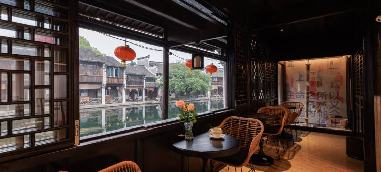 花筑奢·牙绯·临河私汤·设计师度假美宿(南浔古镇百间楼店)图片