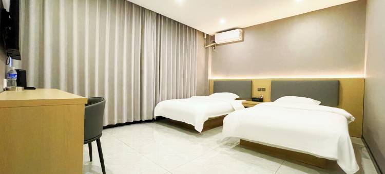 名成商务宾馆(汽开区二实验学校一汽店)图片