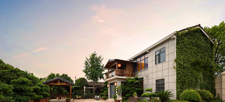 暖云涧民宿(三峡机场店)图片