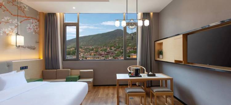 派酒店(巴塘中山广场店)图片