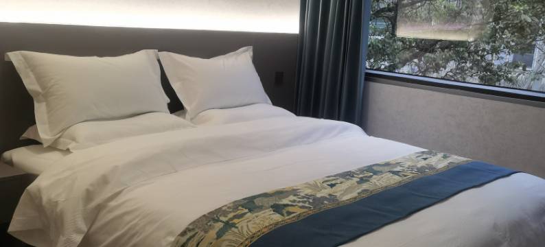 镇巴星期八商务酒店图片