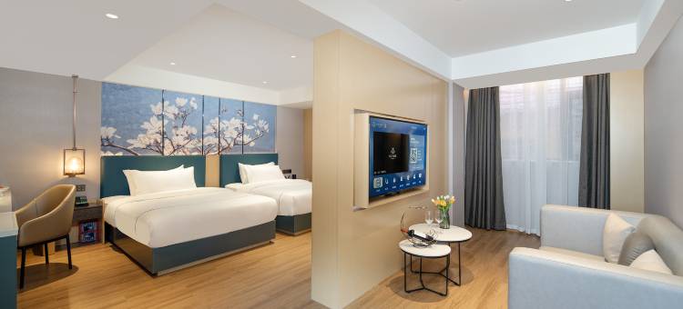 白玉兰酒店(西双版纳景洪泼水广场曼听路店)图片