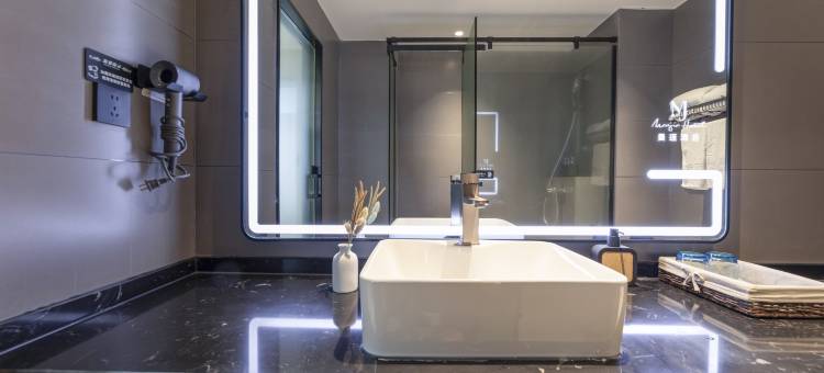 张家港曼瑾酒店(曼巴特购物广场店)图片