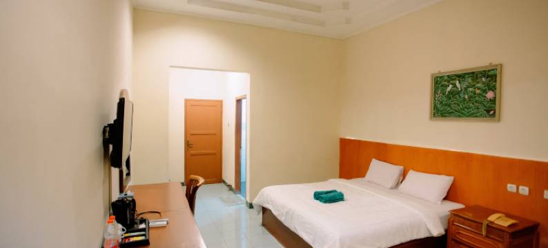 位于泰加尔萨里的2卧室-500平方米|带1个独立浴室(Dewi Ratih Hotel Batang)图片