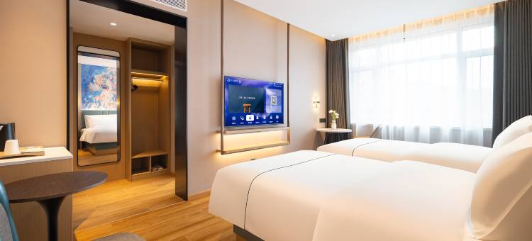 白玉兰酒店(东港黄海大市场店)图片