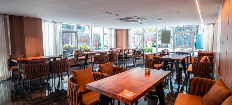 孔雀窝云墅酒店(唐山万达广场建国里商业街店)图片