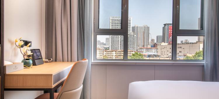 宿岸欢致酒店(临沂泰盛广场万象汇店)图片