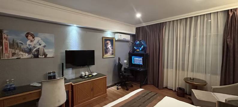 亚信电竞酒店(深圳坪地宜城PARK沃尔玛店)图片