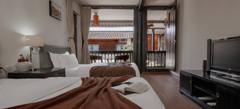 屿白归云艺术家民宿【束河古镇店】图片