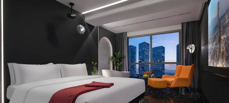 曼朵轻奢智能影音酒店(威海火炬八街国际海水浴场店)图片