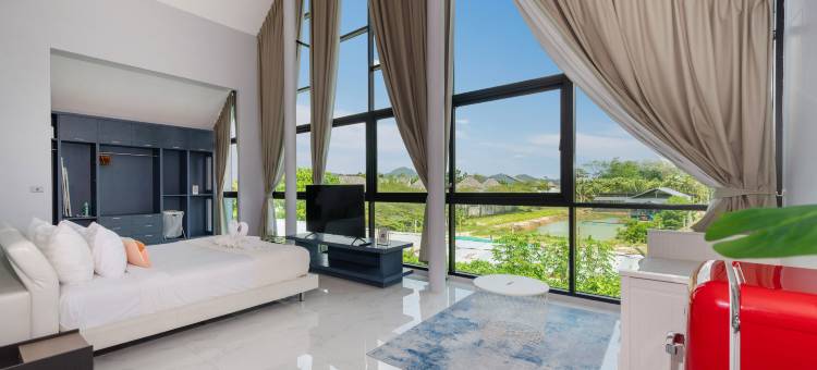 位于拉古纳地区帕萨克的3卧室设计师阁楼别墅度假胜地(Designer Loft 3BR Villa Retreat in Pasak, Laguna Area)图片