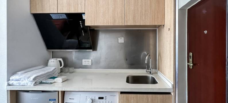 青岛归宿观影民宿(万达CBD店)图片