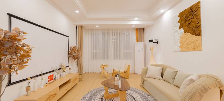 栖牛XINIU·投影自助公寓(乐山万达广场店)图片