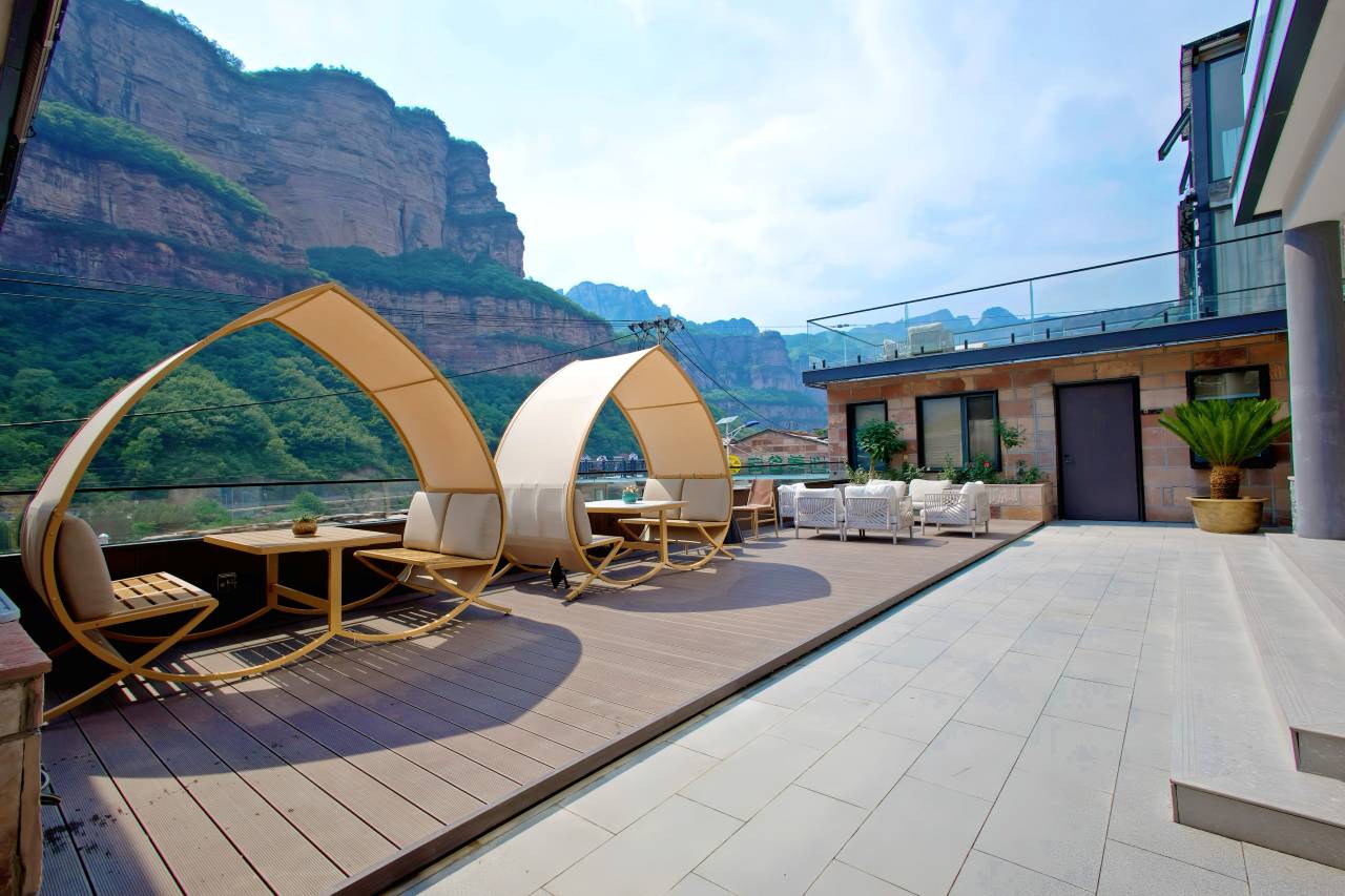 睡莲梦境酒店(林州太行大峡谷石板岩镇店)图片