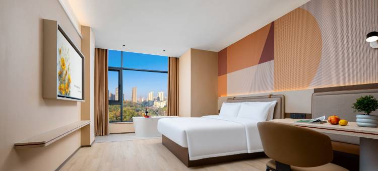 朋桔酒店(信阳高铁东站店)图片