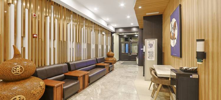 梓里酒店(哈尔滨江北大学城地铁站店)图片