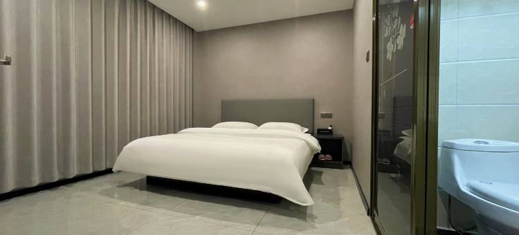 名成商务宾馆(汽开区二实验学校一汽店)图片