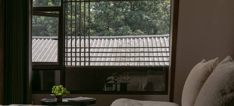 安雲·   十口记独立咖啡美宿(忠义市场木府店)图片