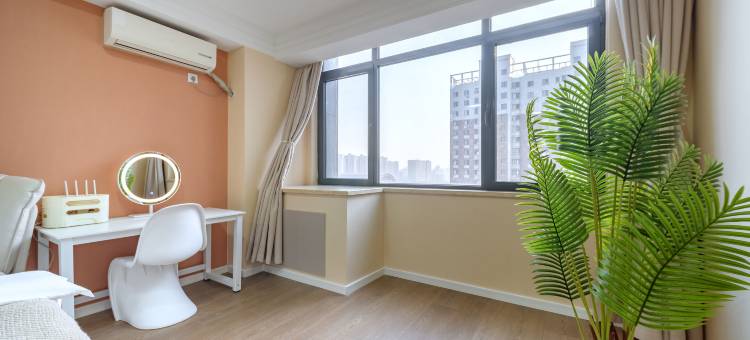 锦爱•影院式民宿(太原街沈阳站西广场店)图片