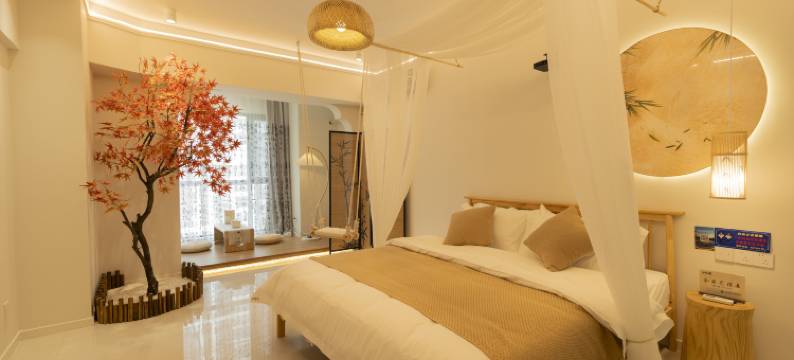 自然醒酒店(万达广场牡丹广场地铁站店)图片