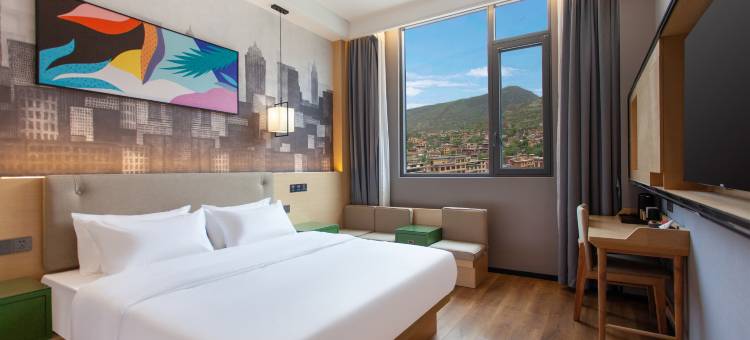 派酒店(巴塘中山广场店)图片