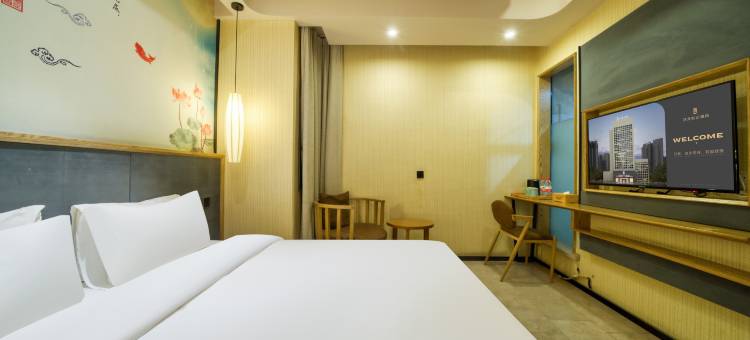 艺龙安云酒店(上海静安体育中心汶水路地铁站店)图片