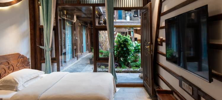 古井•侘寂风日照金山美学设计师360度古城雪山屋顶咖啡美宿图片