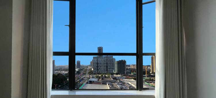 喜遇酒店公寓(天奕国际广场中山站店)图片