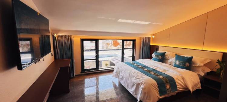 晨雅酒店(开封万岁山大宋武侠城清明上河园店)图片