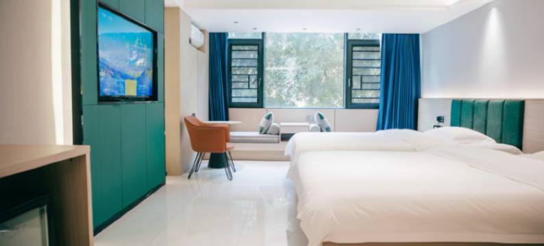 雨林居酒店(西双版纳勐腊客运站店)图片