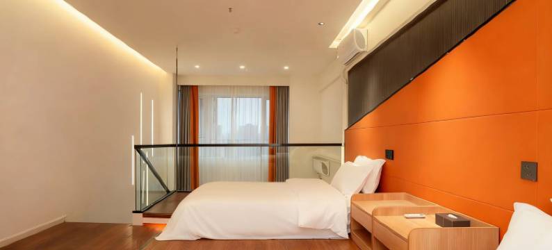 柒月·新屿设计师全智能民宿(乐山高铁站店)图片