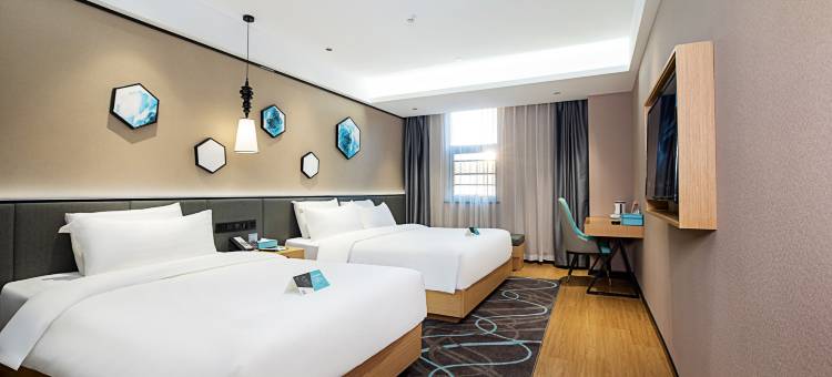 希岸轻雅酒店(新郑龙湖锦艺城店)图片