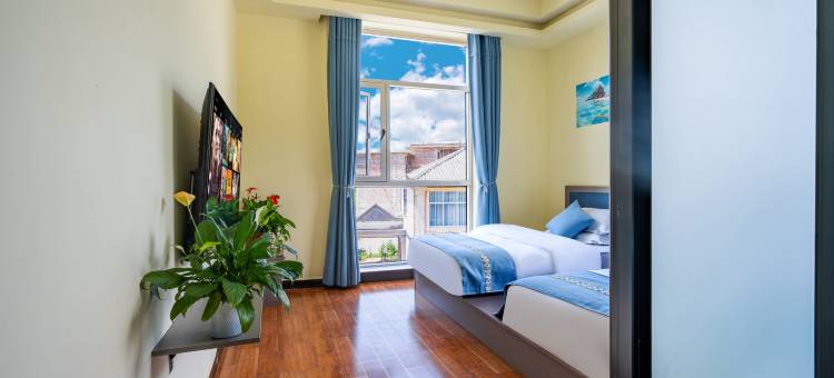 丽江田间小憩民宿(三义国际机场店)图片