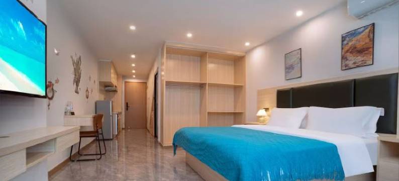 青山春风里民宿(富雅国际生活广场店)图片